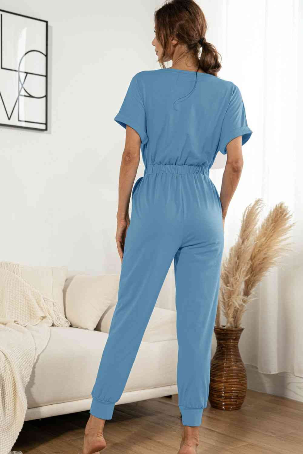 DuskJumpers Surplice Neck Tied Short Sleeve Jumpsuit