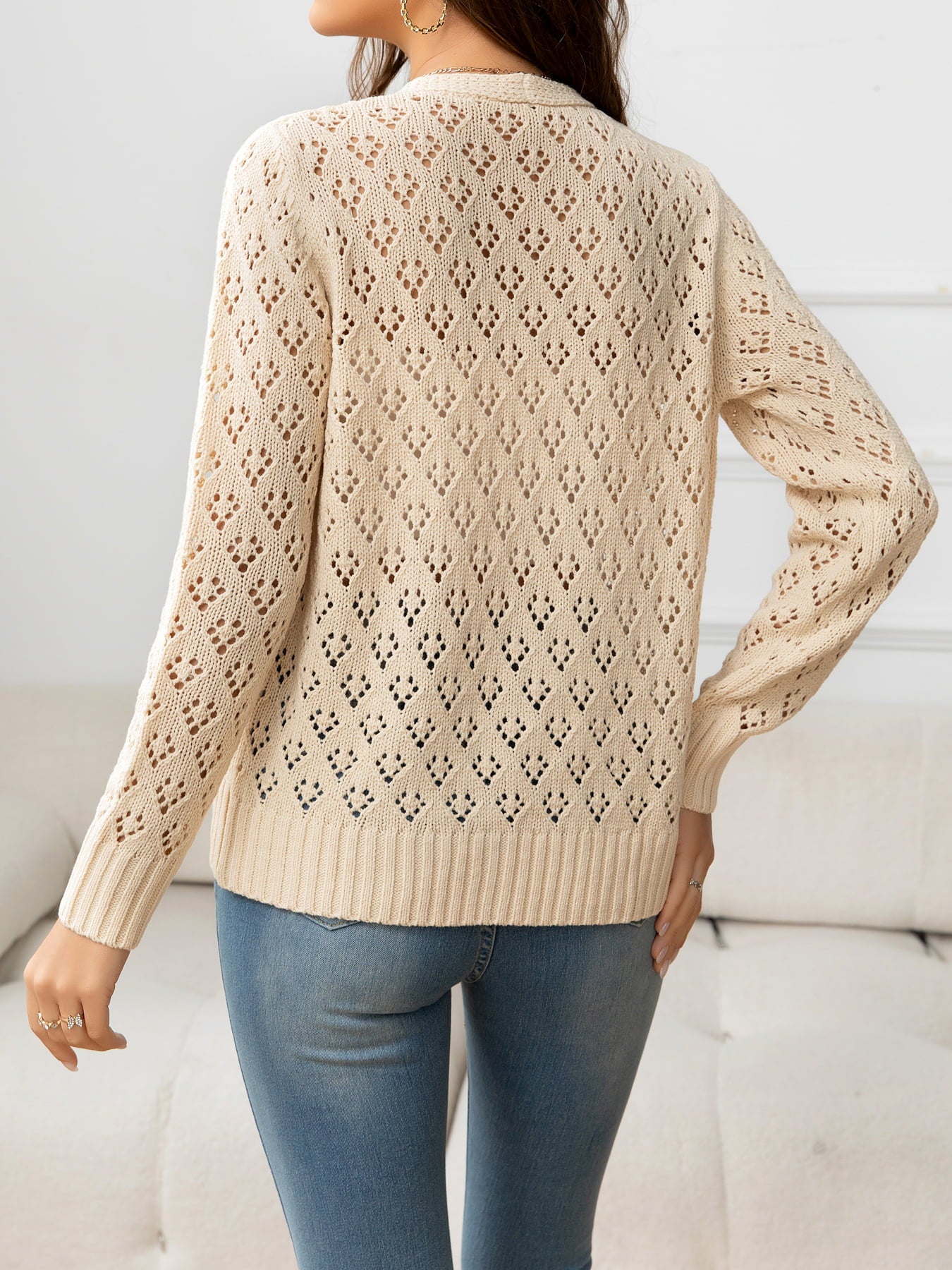 Beauteous Openwork V-Neck Buttoned Knit Top
