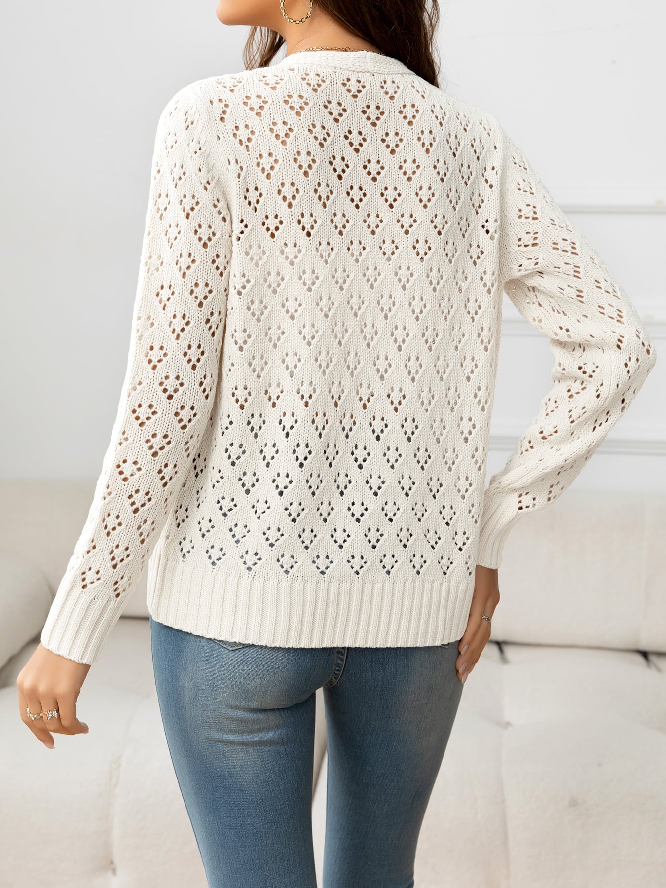 Beauteous Openwork V-Neck Buttoned Knit Top
