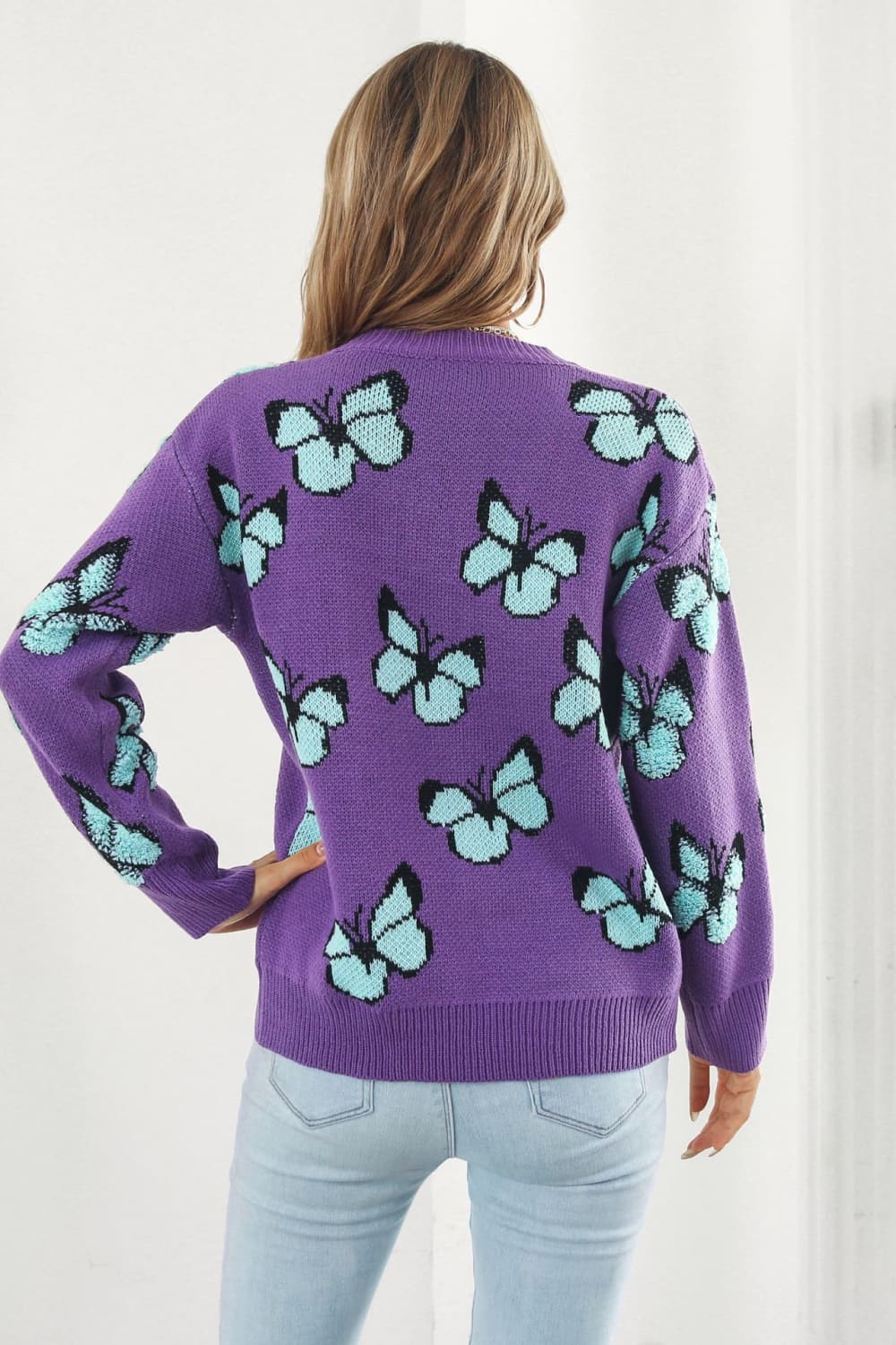 TrendiStyles Butterfly Pattern Round Neck Dropped Shoulder Sweater 🦋