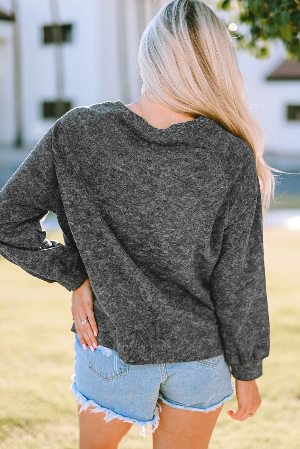 Mineral Washed COW'S FIRST RODEO Round Neck Raglan Sleeve Sweatshirt