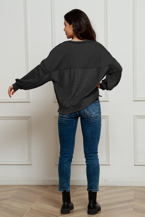 Exposed Seam Half Button Long Sleeve Sweatshirt